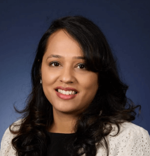 Dental clinic dental hygienist performing teeth cleaning