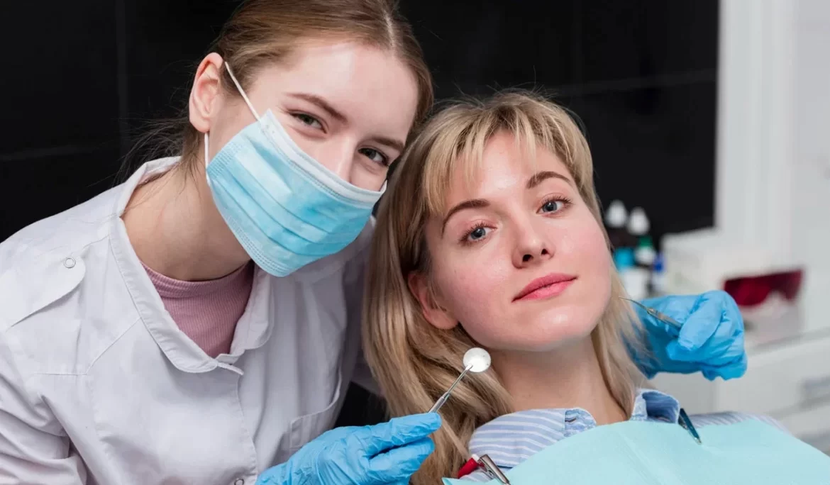 Happy child receiving dental checkup from pediatric dentist
